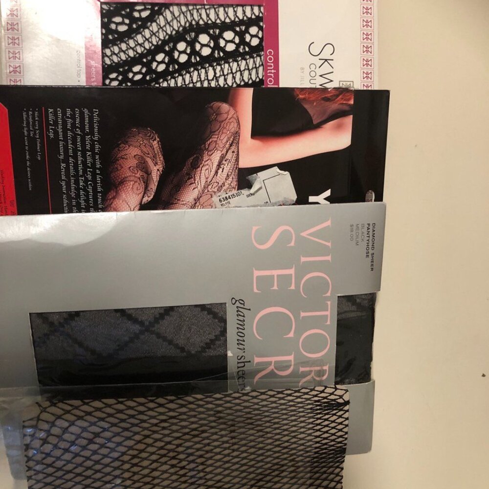 Bundle of queen size patterned pantihose.